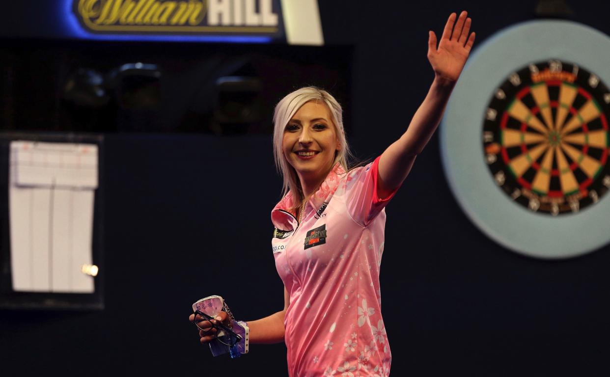 Fallon Sherrock celebrating after becoming the first women to win a game in the PDC William Hill World Championship during day five of the William Hill World Championships at Alexandra Palace, London. PA Photo. Picture date: Tuesday December 17, 2019. See PA story DARTS World. Photo credit should read: Steven Paston/PA Wire. 