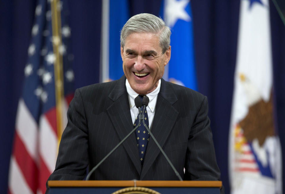 <p>Outgoing FBI Director Robert Mueller smiles as he speaks at the Justice Department in Washington, Thursday, Aug. 1, 2013, during his farewell ceremony. Mueller is stepping down in September after 12 years heading the agency. (Photo: Evan Vucci/AP) </p>