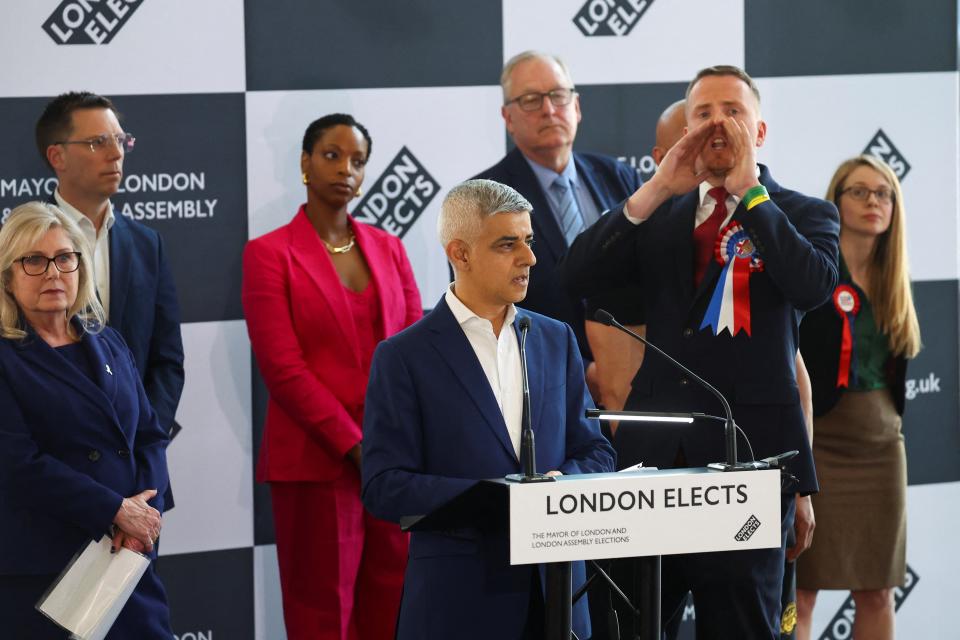 Britain First candidate Nick Scanlon heckles as Sadiq Khan speaks on the day of the results of the London mayoral election (REUTERS)