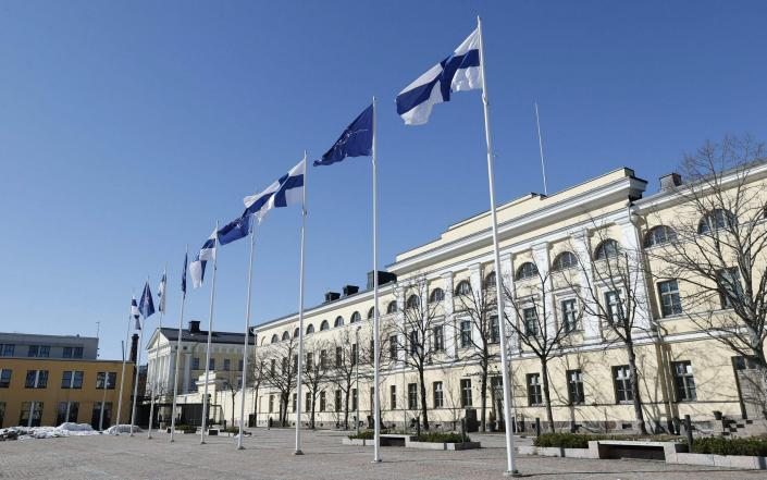 Finnish and Nato flags flutter at the courtyard of the Foreign Ministry in Helsinki, Finland - ANTTI HAMALAINEN/Lehtikuva/AFP via Getty Images