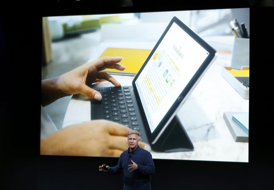 Phil Schiller, senior VP of worldwide marketing for Apple, introduces the iPad Pro with 9.7-inch display during an event at the Apple headquarters in Cupertino, California March 21, 2016. REUTERS/Stephen Lam