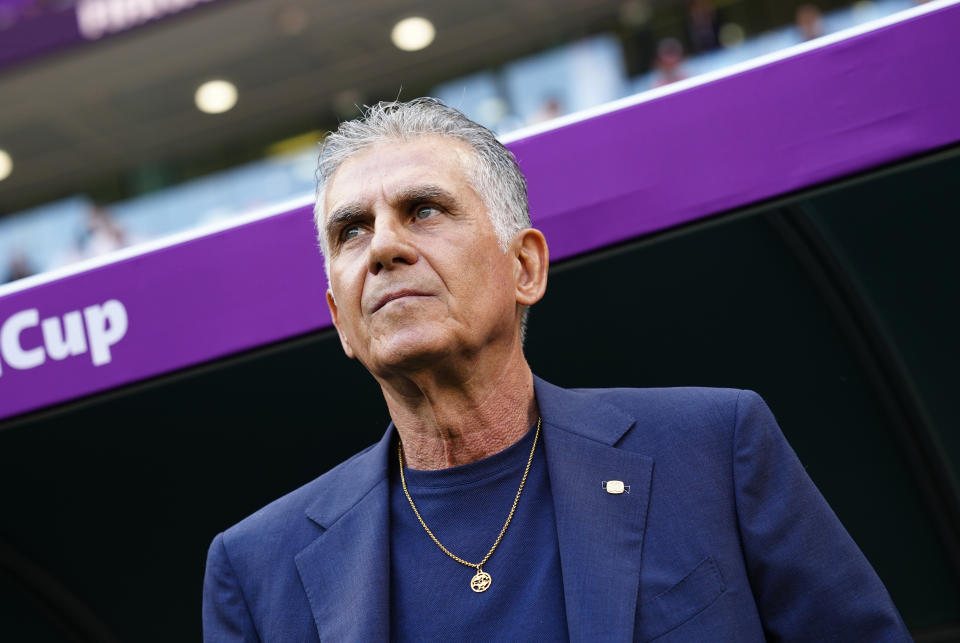 Iran's head coach Carlos Queiroz looks on ahead the start of the World Cup group B soccer match between Wales and Iran, at the Ahmad Bin Ali Stadium in Al Rayyan , Qatar, Friday, Nov. 25, 2022. (AP Photo/Pavel Golovkin)