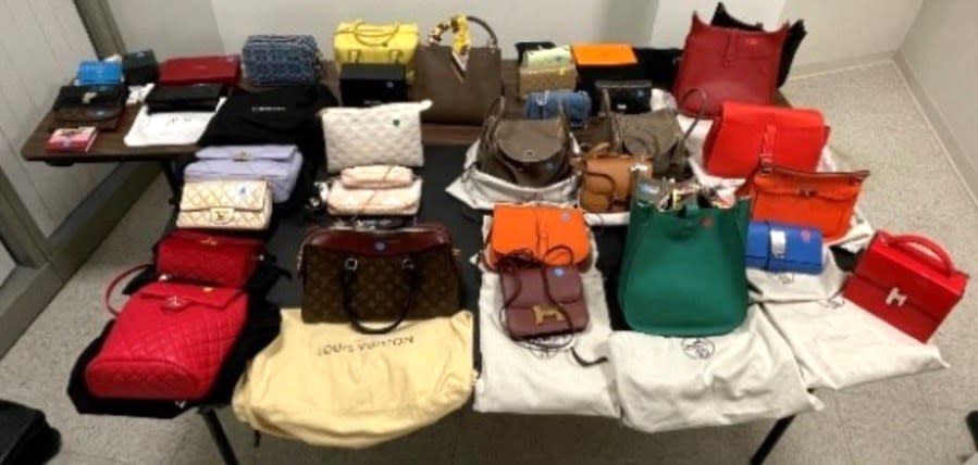 A woman was arrested for allegedly operating a crime fence that involved stolen luxury handbags throughout Southern California. (Los Angeles Police Department)