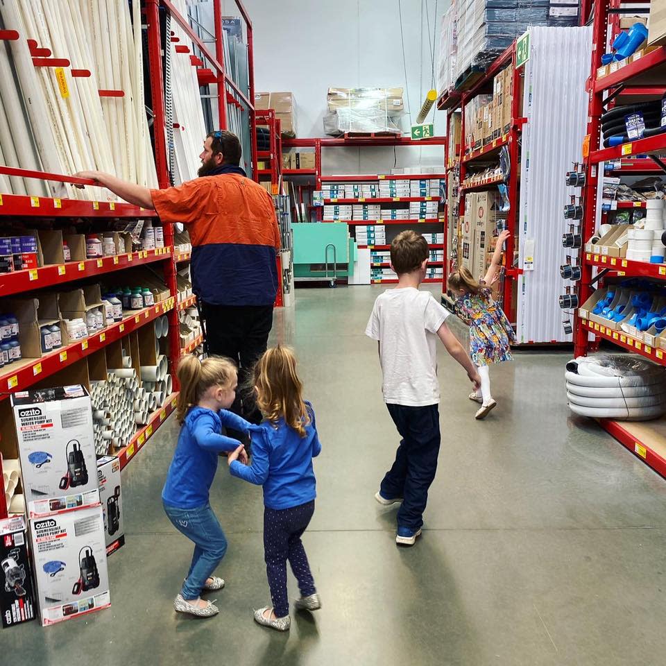 Gary Pascoe and his children shopping at Bunnings