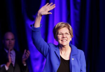 FILE PHOTO -- Senator Elizabeth Warren (D-MA) waves at the BlueGreen Alliance Foundation's 2015 Good Jobs, Green Jobs Conference in Washington, April 13, 2015. REUTERS/Yuri Gripas/File Photo