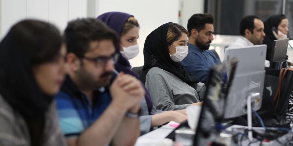 iran stock market coronavirus lockdown masks