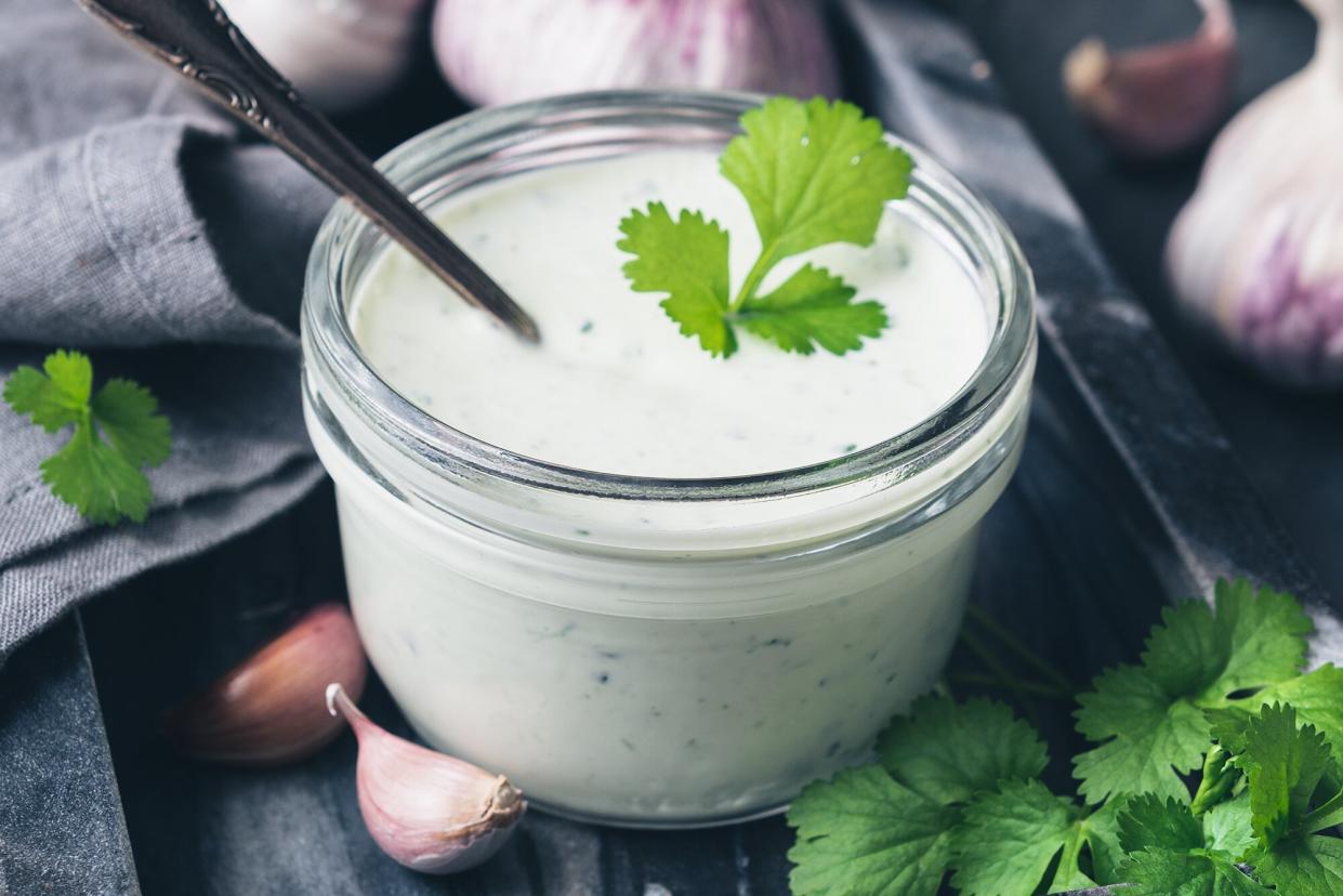 a photo of a jar of creamy dressing