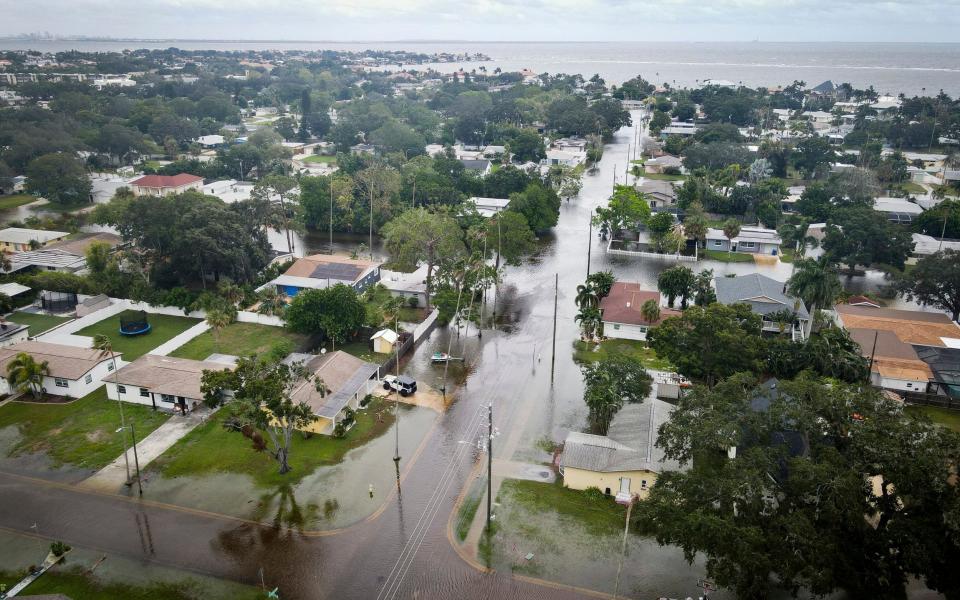 Flooded streets are seen in Madeira Beach, Florida, on Thursday