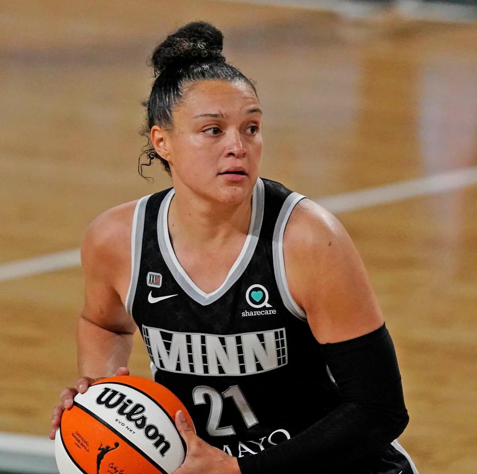 Minnesota Lynx guard Kayla McBride looks to pass during the second half of their WNBA game against the Atlanta Dream Wednesday, June 23, 2021, in College Park, Georgia.