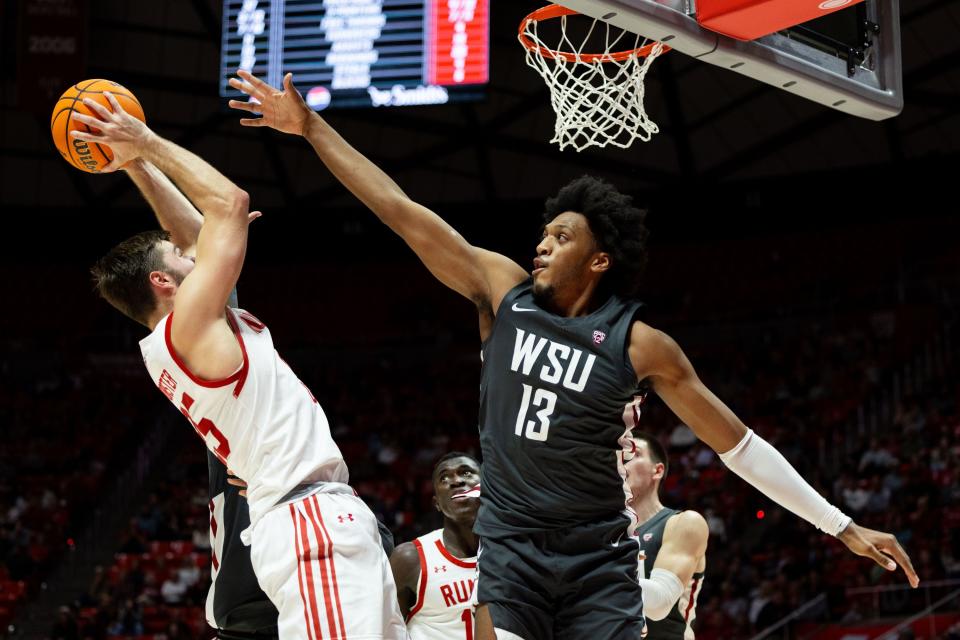 Utah Utes guard Rollie Worster (25) shoots the ball with Washington State Cougars forward Isaac Jones (13) on defense during a men’s college basketball game between the University of Utah and Washington State University at the Jon M. Huntsman Center in Salt Lake City on Friday, Dec. 29, 2023. | Megan Nielsen, Deseret News