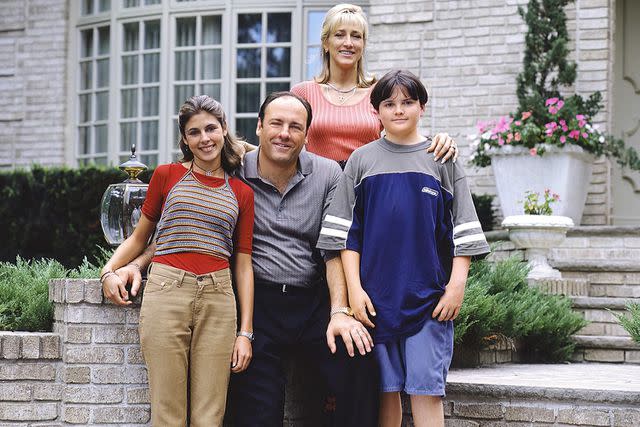 <p>HBO/Courtesy Everett Collection</p> Jamie-Lynn Sigler, James Gandolfini, Edie Falco and Robert Iler on the set of The Sopranos in 1999.