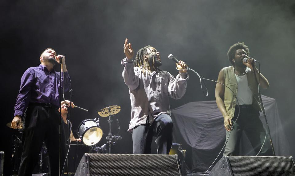 (L-R) Graham "G" Hastings, Kayus Bankole and Alloysious Massaquoi of the band Young Fathers perform during a stop of Depeche Mode's Memento Mori World Tour at T-Mobile Arena on December 01, 2023 in Las Vegas.