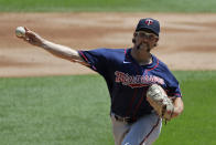 Minnesota Twins starting pitcher Randy Dobnak throws the ball against the Chicago White Sox during the first inning of a baseball game in Chicago, Saturday, July 25, 2020. (AP Photo/Nam Y. Huh)