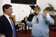 Josh Mandel, left, a Republican former Ohio treasurer running for an open U.S. Senate seat in Ohio, argues with Julian Mack, a community organizer from Toledo, after Mandel debated Morgan Harper, a progressive Democrat, Thursday, Jan. 27, 2022, in Columbus, Ohio. (AP Photo/Jay LaPrete)