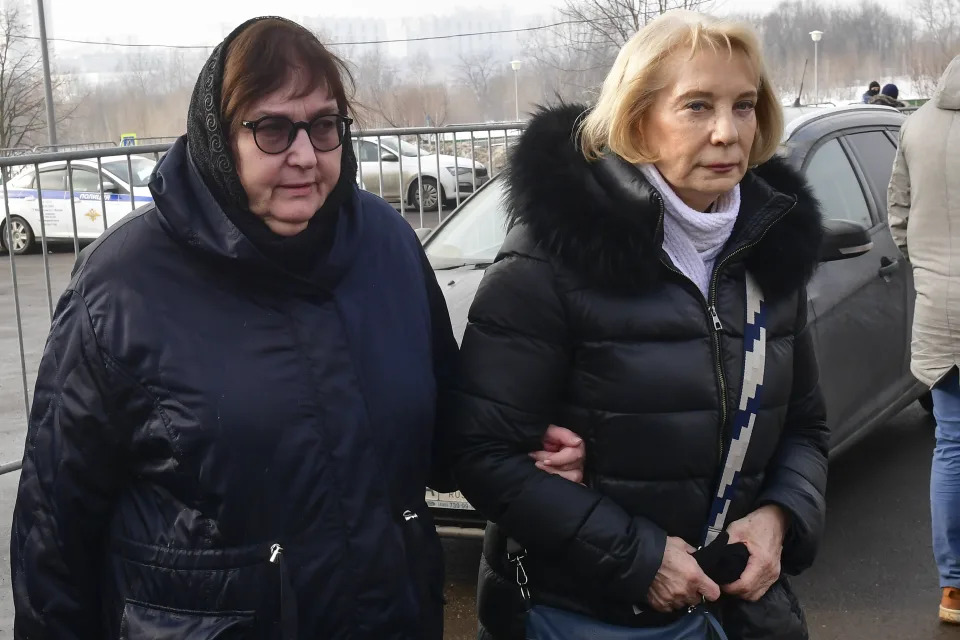 Russian opposition leader Alexei Navalny's mother, Lyudmila Navalnaya, left, and his mother-in-law, no name available, arrive to visit the grave of Alexei Navalny after his funeral yesterday at the Borisovskoye Cemetery, in Moscow, Russia, on Saturday, March 2, 2024. Navalny, who was President Vladimir Putin's fiercest foe, was buried after a funeral that drew thousands of mourners amid a heavy police presence. (AP Photo)