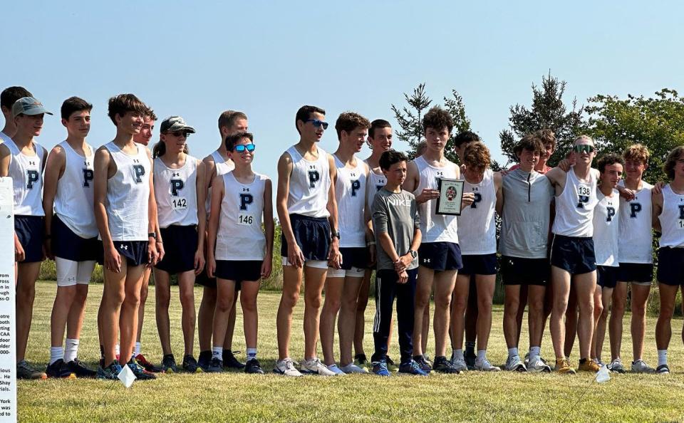 The Petoskey boys' cross country team shows off their first place finish for the large school division in the Ryan Shay Relays this weekend.