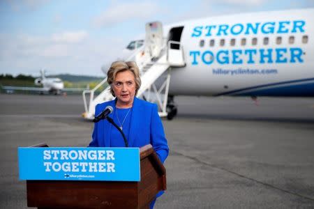 U.S. Democratic presidential candidate Hillary Clinton holds a news conference on the airport tarmac in front of her campaign plane in White Plains, New York, United States September 8, 2016. REUTERS/Brian Snyder