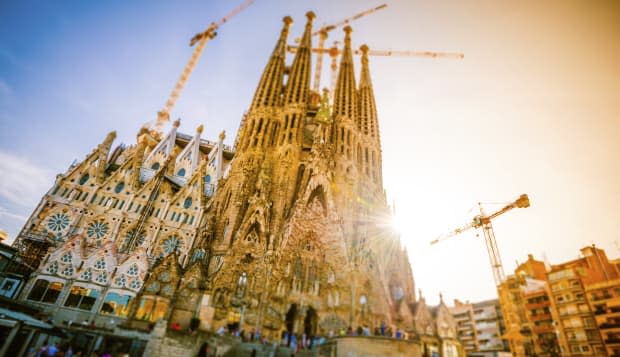 The famous church designed by the spanish architect Antoni Gaudi, taken in backlight with tilt shift effect and toning.