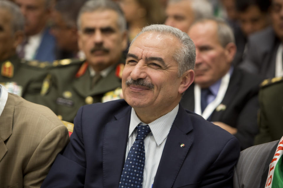 File - This Monday, April 30, 2018 file photo shows a senior Fatah official Mohammad Ishtayeh during a meeting of the Palestinian National Council in the West Bank city of Ramallah. Palestinian officials say that President Mahmoud Abbas has chosen longtime adviser Ishtayeh as his new prime minister. (AP Photo/Majdi Mohammed, File)