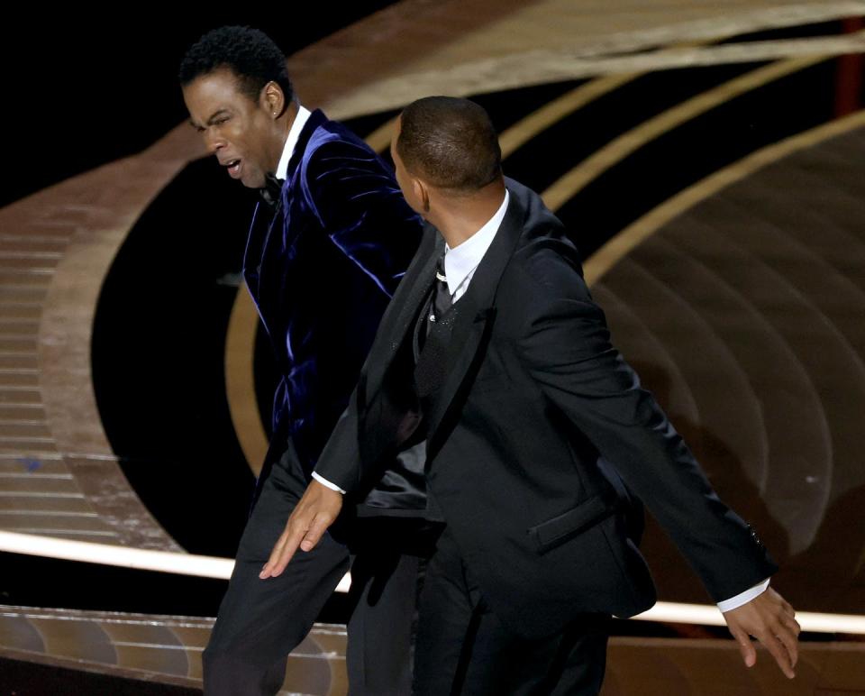 <span class="caption">Will Smith slaps Chris Rock onstage during the 94th annual Academy Awards on March 27, 2022, in Los Angeles, Calif.</span> <span class="attribution"><a class="link " href="https://www.gettyimages.com/detail/news-photo/will-smith-appears-to-slap-chris-rock-onstage-during-the-news-photo/1388085444?adppopup=true" rel="nofollow noopener" target="_blank" data-ylk="slk:Neilson Barnard/Getty Images;elm:context_link;itc:0;sec:content-canvas">Neilson Barnard/Getty Images</a></span>