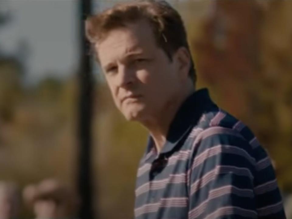 Colin Firth playing golf and missing the hole in "Arthur Newman."