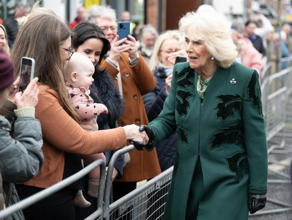 PHOTO: Queen Camilla meets well wishers after visiting Knotts bakery, March 21, 2024, in Belfast, Northern Ireland.   (Samir Hussein/Pool/Getty Images)