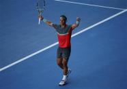 Rafael Nadal of Spain celebrates defeating Grigor Dimitrov of Bulgaria in their men's singles quarter-final tennis match at the Australian Open 2014 tennis tournament in Melbourne January 22, 2014. REUTERS/Jason Reed