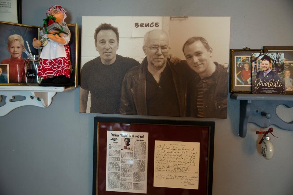 One of Michael Riley's prize possessions was a photo of himself, his son Josh, and Bruce Springsteen, taken backstage at the Meadowlands in 2012, and a letter the Boss sent him regarding his column.