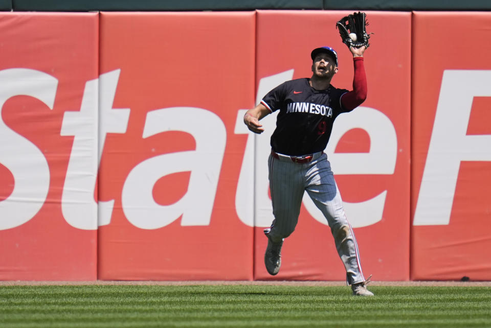 Minnesota Twins left fielder Trevor Larnach catches a sacrifice fly from Chicago White Sox's Paul DeJong during the fifth inning of a baseball game Wednesday, July 10, 2024, in Chicago. (AP Photo/Erin Hooley)