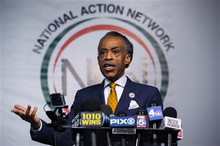 Reverend Al Sharpton speaks during a news conference held to address local media reports regarding his relationship with the FBI during the 1980s in New York April 8, 2014. REUTERS/Lucas Jackson