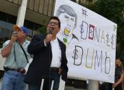 Juan Jose Gutierrez leads a coalition of Latino community leaders in a protest against the policies of Republican presidential hopeful Donald Trump, outside the Federal Building in Los Angeles, California on August 19, 2015