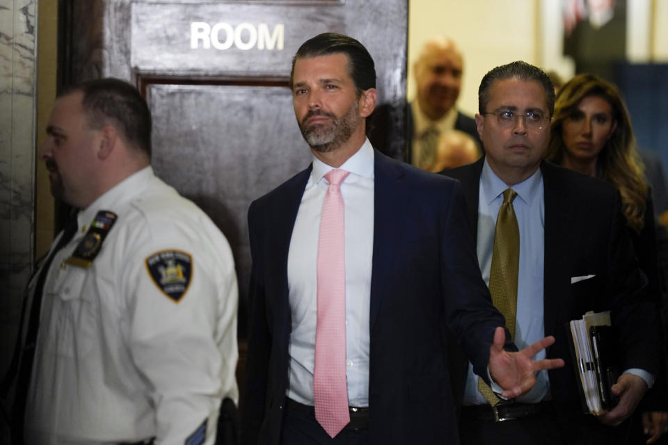 Donald Trump Jr. leaves after testifying in former President Donald Trump's civil business fraud trial, Wednesday, Nov. 1, 2023, in New York. (AP Photo/Seth Wenig)