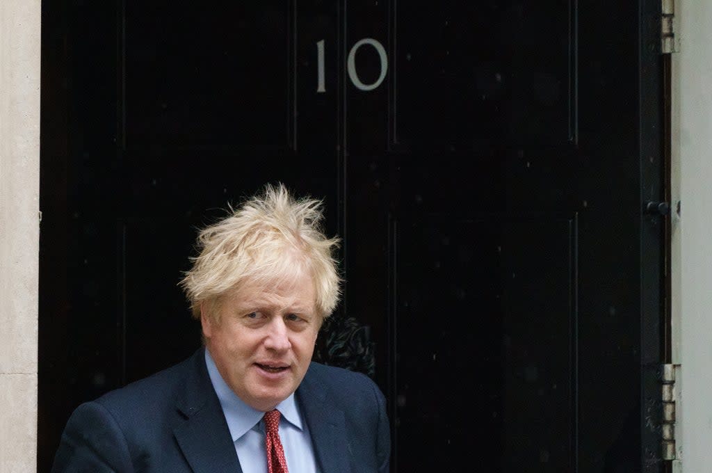 Boris Johnson is facing fresh accusations he lied to Parliament after photographs emerged of him raising a glass at a No 10 leaving party during lockdown (Dominic Lipinski/PA) (PA Wire)