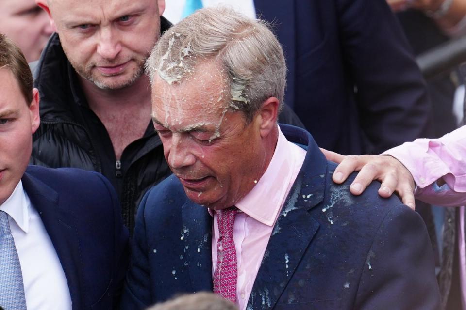 Mr Farage covered in milkshak (Getty Images)