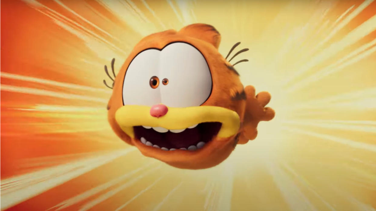  Garfield looks scared while flying through the air in The Garfield Movie. 