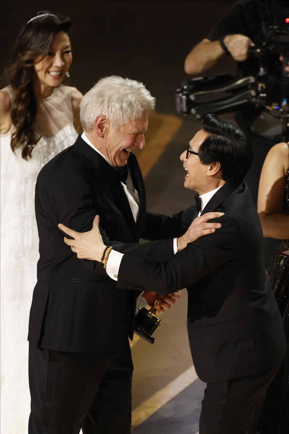 Ke Huy Quan and Harrison Ford during the Oscar Awards (ABC via Getty Images)