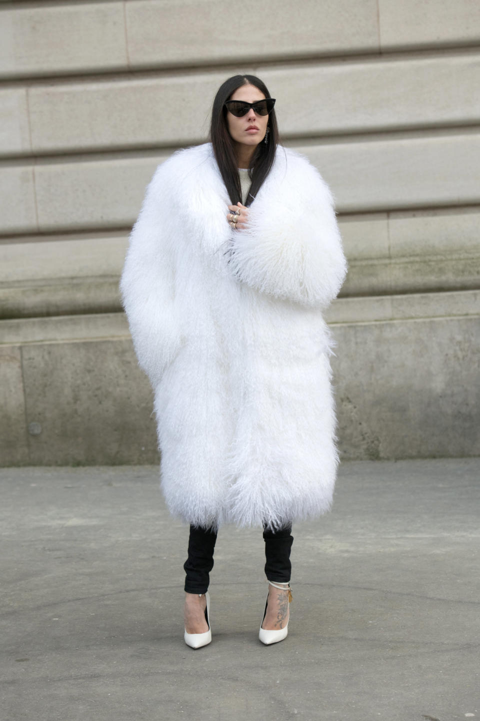 Fashion designer Gilda Ambrosio wears a Numero Otto coat during Paris fashion week in February.