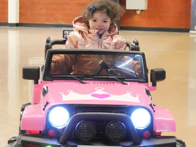 <p>Melanie Willardson</p> Calliope Lindau driving her new car