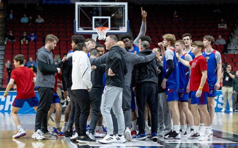 Kansas players huddle before a team shoot around a day ahead of Kansas’ first round game against Howard in the NCAA college basketball tournament Wednesday, March 15, 2023, in Des Moines, Iowa.