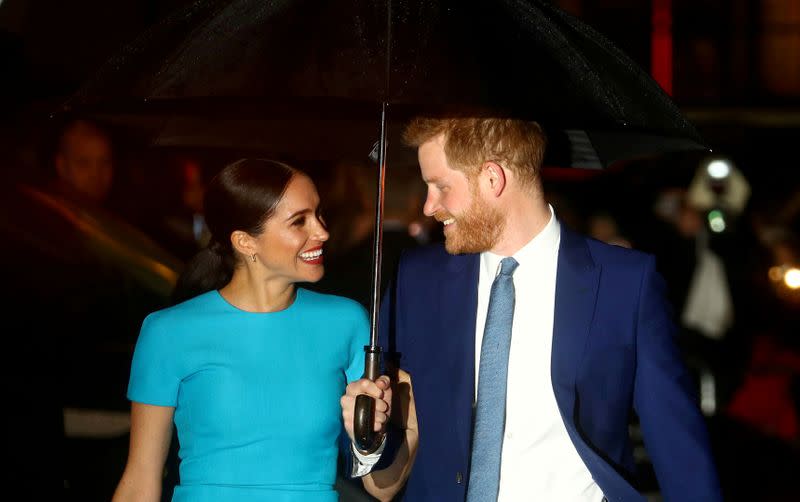 FILE PHOTO: Britain's Prince Harry and his wife Meghan, Duchess of Sussex, arrive at the Endeavour Fund Awards in London