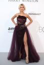 <p>Hailey Baldwin<span class="redactor-invisible-space"> wore a dark purple tulle Elie Saab gown to attend the amfAR gala in Cannes.</span></p>