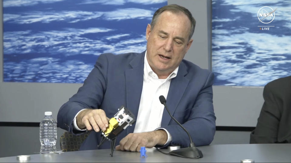 In this image from video provided by NASA, Steve Altemus, CEO and co-founder of Intuitive Machines, describes how it is believed the company's Odysseus spacecraft landed on the surface of the moon, during a news conference in Houston on Friday, Feb. 23, 2024. (NASA via AP)