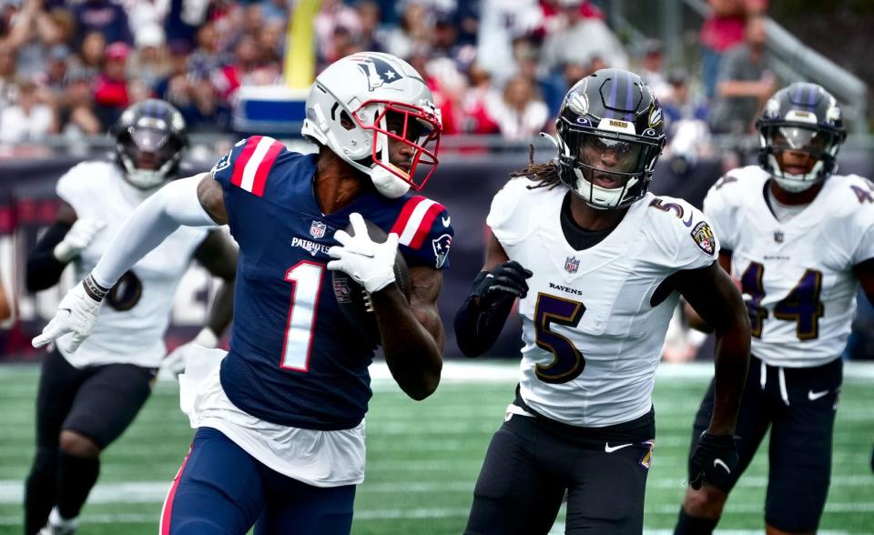 Patriots receiver DeVante Parker tries to outrun a Ravens defender during a game last season.