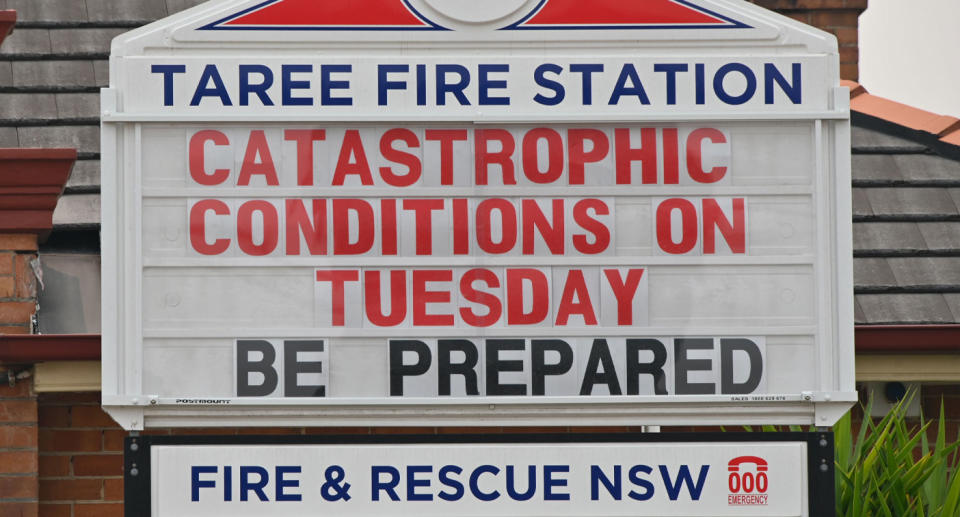 RFS notice at Taree fire station about catastrophic fire danger warning.