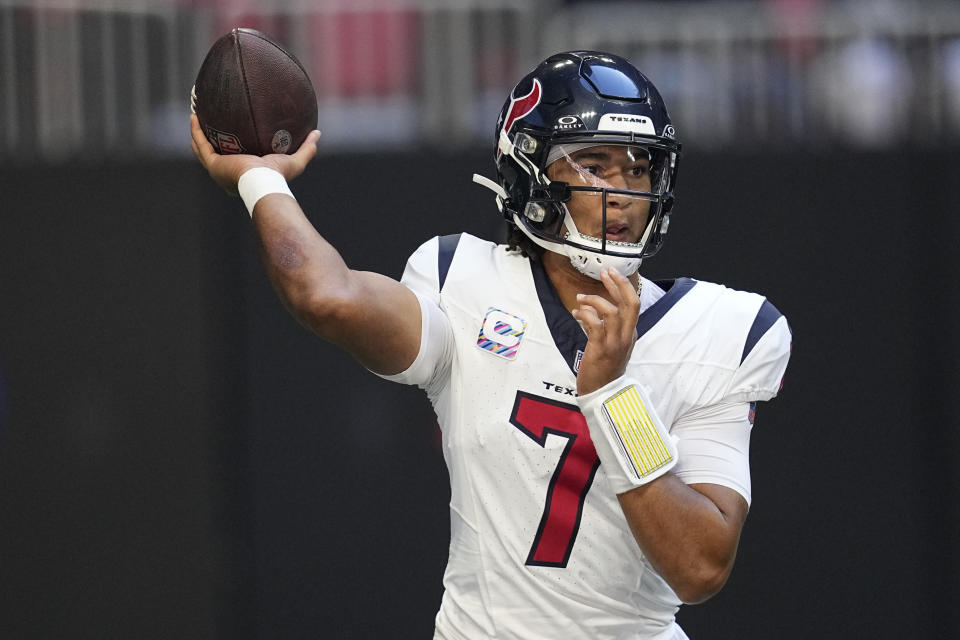 Houston Texans quarterback C.J. Stroud (7) sets back to pass in the first half of an NFL football game against the Atlanta Falcons in Atlanta, Sunday, Oct. 8, 2023. (AP Photo/Mike Stewart)