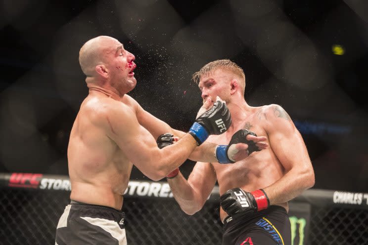 Alexander Gustafsson (R) cracks Glover Teixeira with an uppercut during his fifth-round KO Sunday in Stockholm, Sweden. (Getty Images)