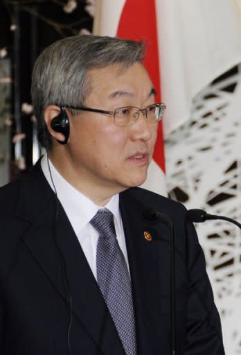 South Korean Foreign Minister Kim Sung-Hwan talks at a media event in Tokyo. Kim has said the government would launch a special joint investigation into a scandal involving three Korean diplomats who are now in Seoul after leaving their posts in Shanghai