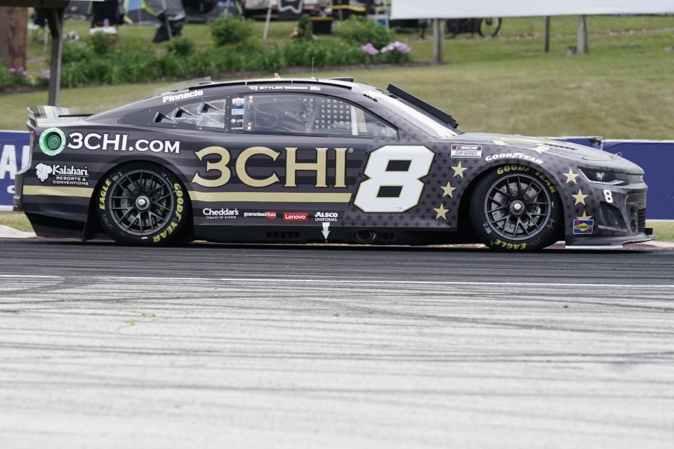 Tyler Reddick gets around a turn during a NASCAR Cup Series auto race Sunday, July 3, 2022, at Road America in Elkhart Lake, Wis. (AP Photo/Morry Gash)