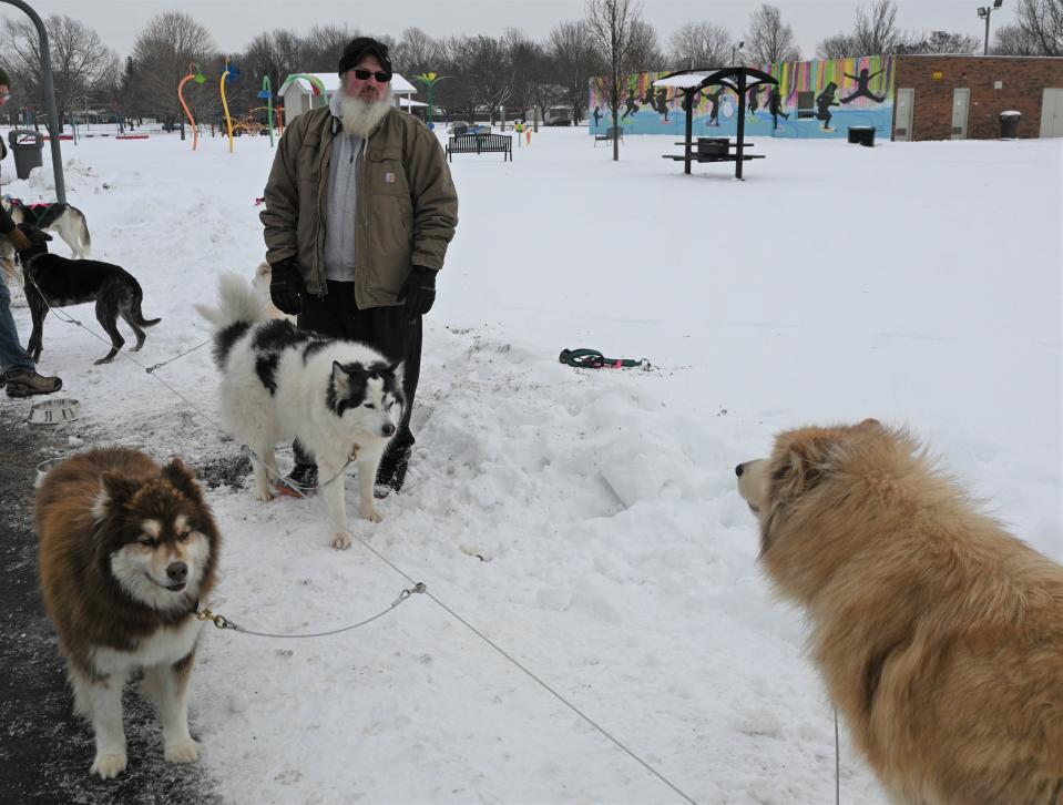 Ty Streeter of Sherwood started running sled dogs to exercise his 11 rescue dogs.