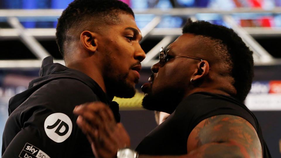 Jarrell Miller (R) pushes Anthony Joshua during the face-off prior to the start of the Press Conference at Madison Square Garden. (Photo by Mike Stobe/Getty Images)